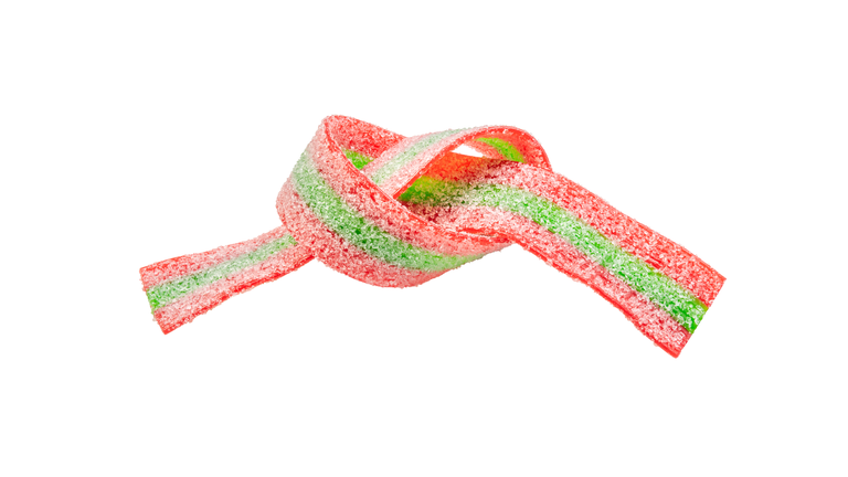 Multicolored strip of marmalade isolated on a white background