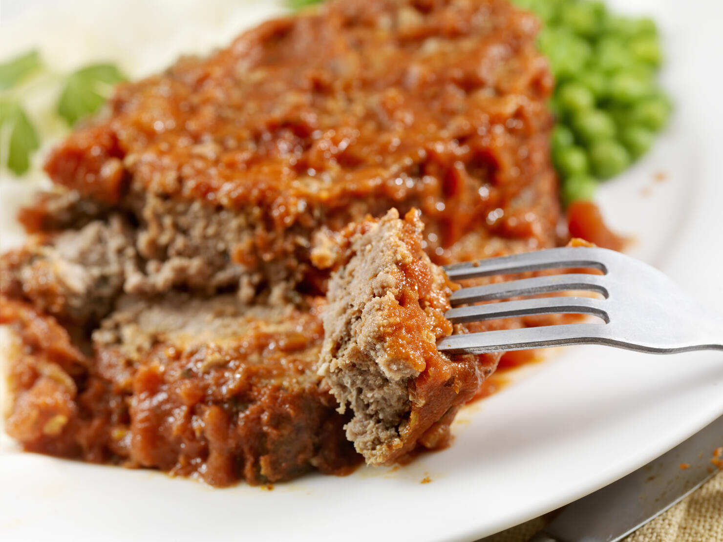 Meatloaf Baked In Tomato Sauce