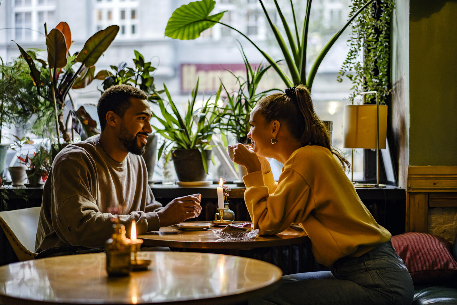Couple on a weekend date at cute cafe