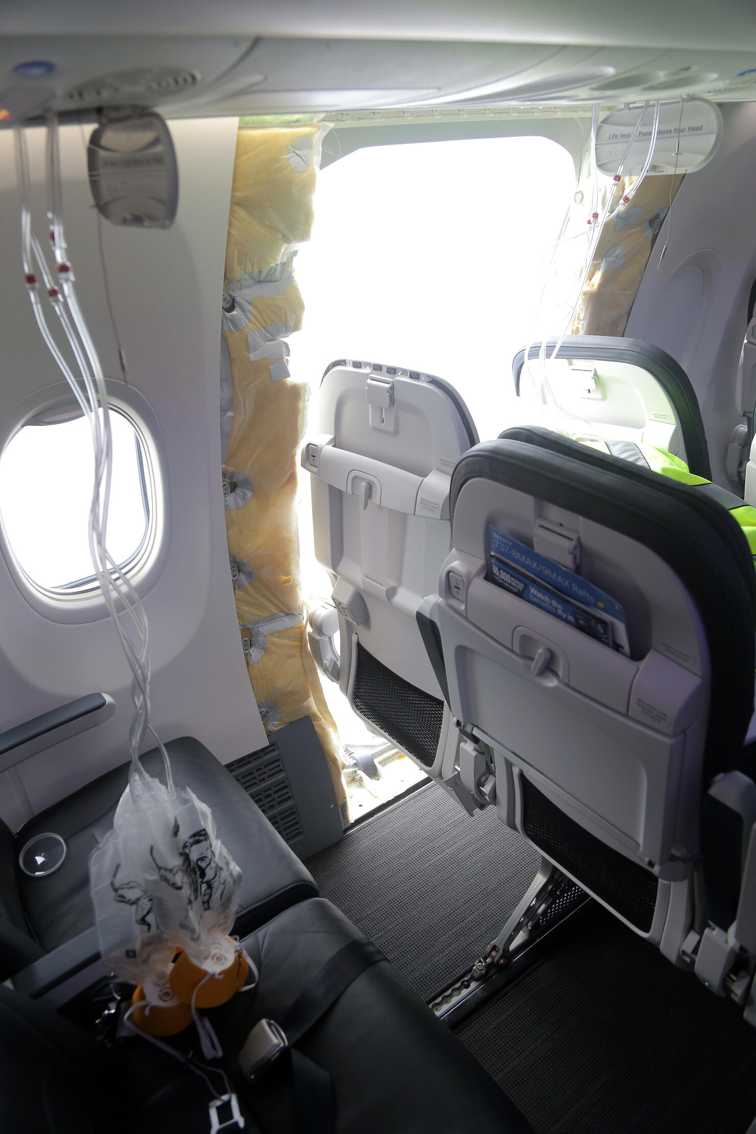 NTSB Investigates Alaska Airlines Flight 1282 After Section Of Plane Blew Off During Flight