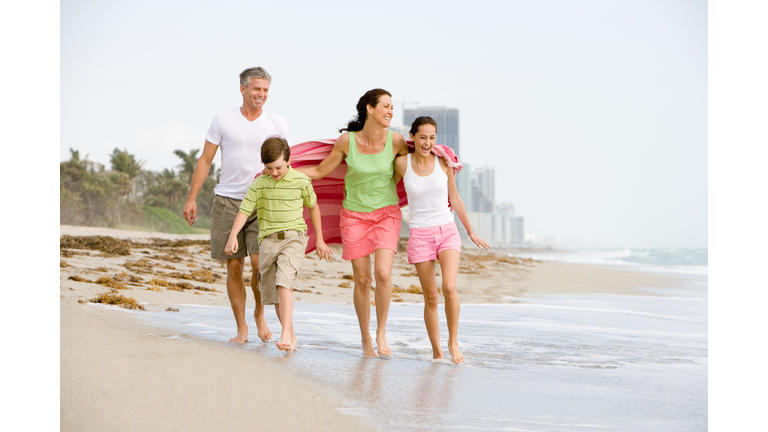 Family walking on the beach