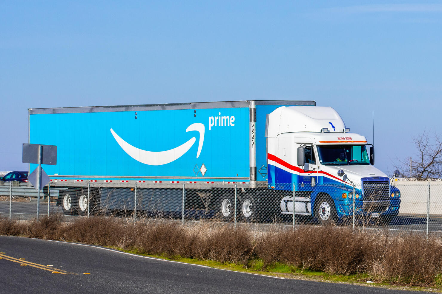 Amazon truck driving on the interstate