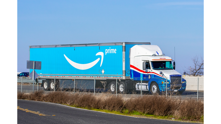 Amazon truck driving on the interstate