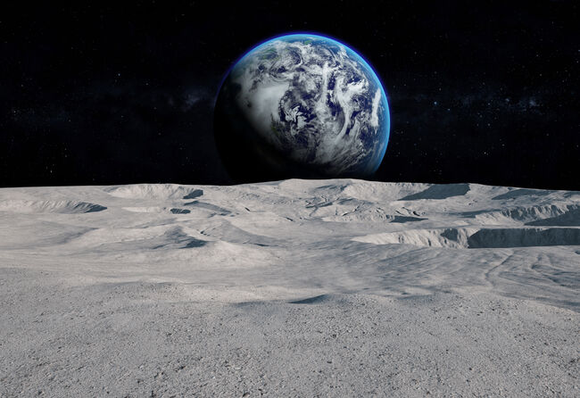Moon surface with distant Earth and starfield