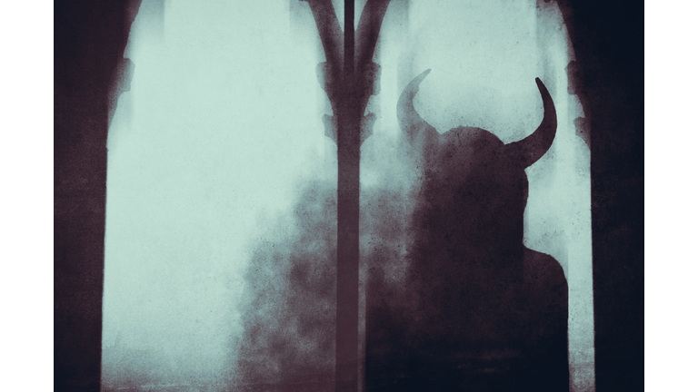 A dark fantasy concept . Of a mysterious devil woman with horns, looking out of a window in an old building, With a blurred, abstract edit.