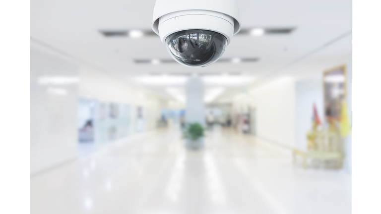 CCTV Security Camera operating in hospital on blur background.