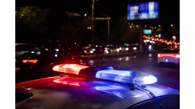 police car lights at night in city