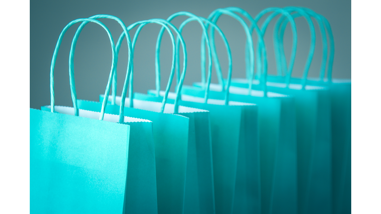 Line of blue gift bags