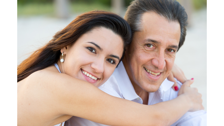 Mature man and young woman