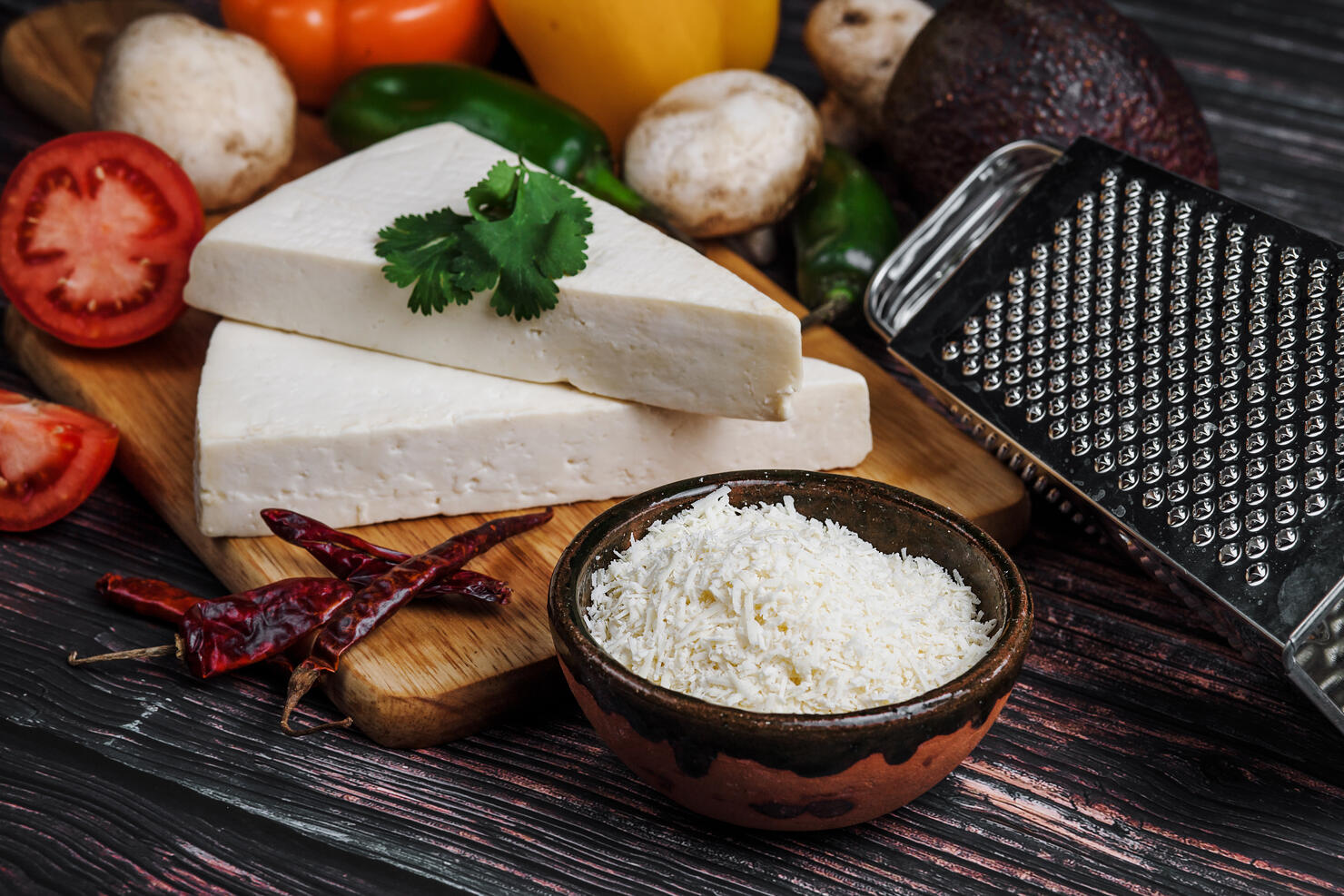 Mexican white Cotija cheese, tequila shot with fresh ingredients in Mexico Latin America