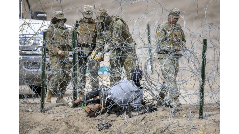 Migrants Continue To Cross Mexico U.S. Border As D.C. Lawmakers Continue To Debate Border Funding