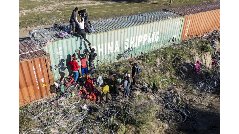 Surge Of Migrants Overwhelms Border Crossings