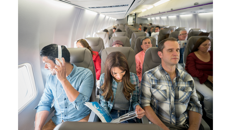 Latin American people traveling by plane