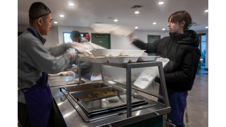 New York Church Feeds Migrants Awaiting Processing In NYC