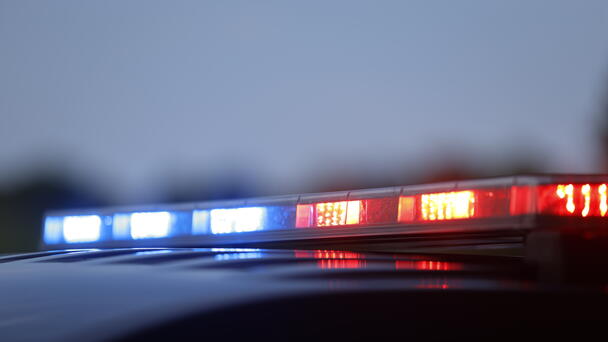 DMPD Investigating After Video of Rifle on Top of Police Car Goes Viral