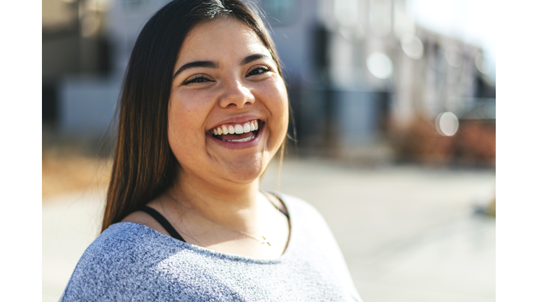 Attractive Generation Z Young Woman of Hispanic Ethnicity Smiling for a Portrait