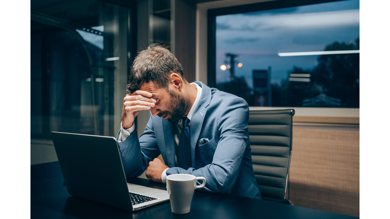 Businessman working late in the office.