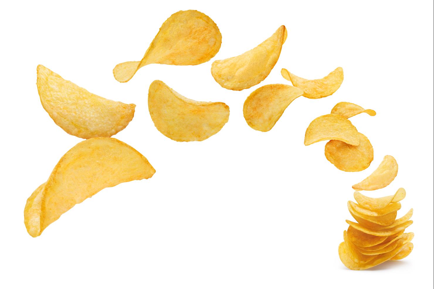 Delicious potato chips on white