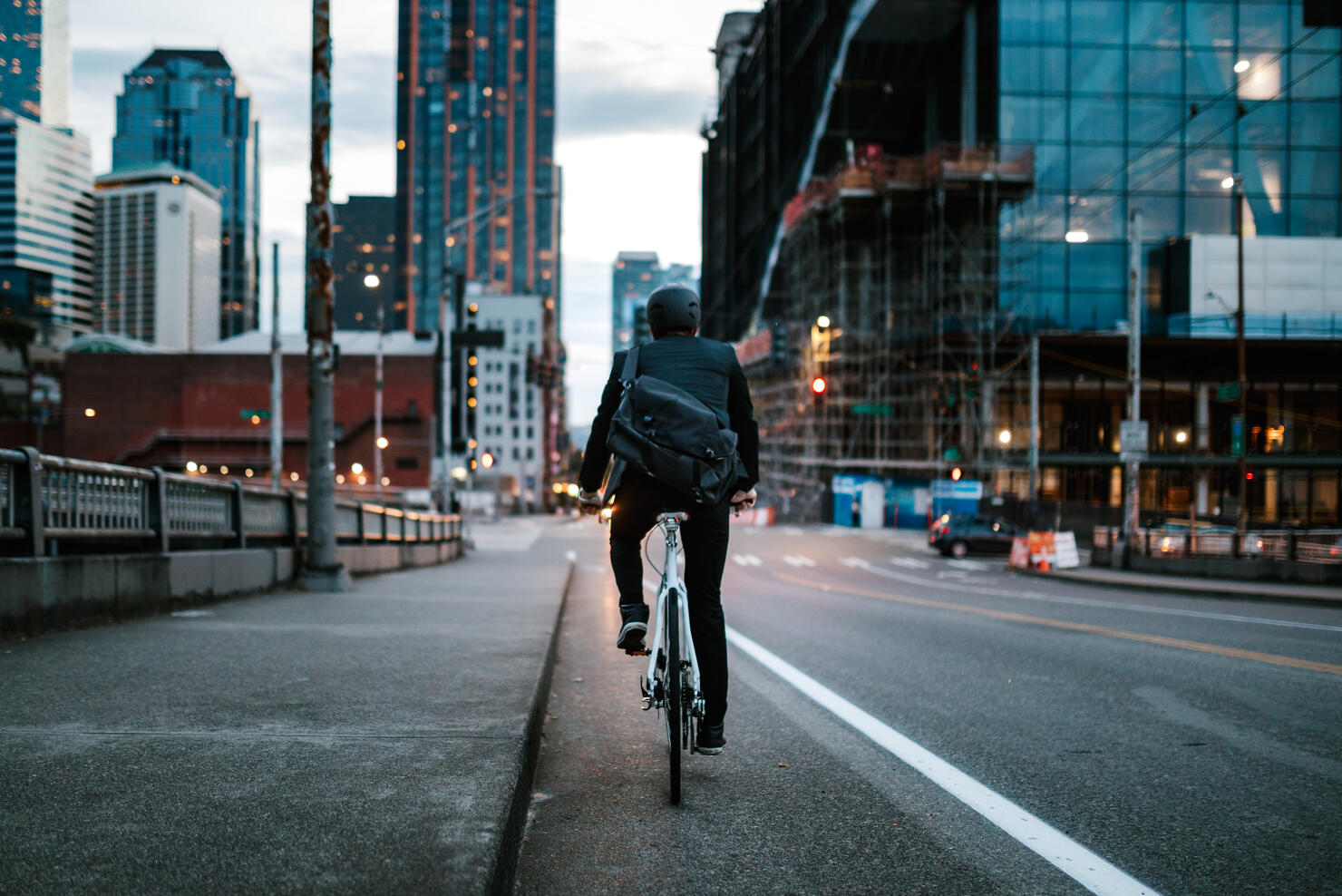 Bike Riding Urban Commuter at Dusk