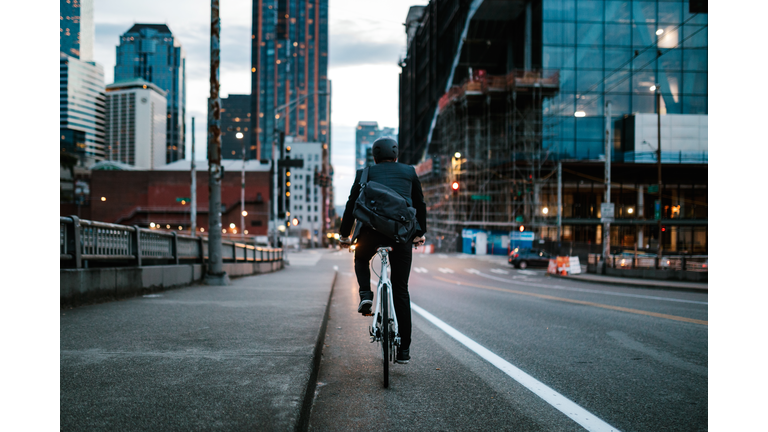 Bike Riding Urban Commuter at Dusk