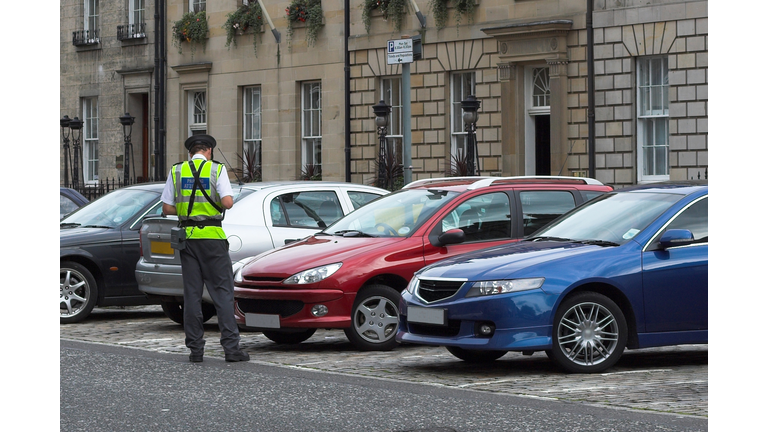 parking attendant, traffic warden, getting ticket fine mandate