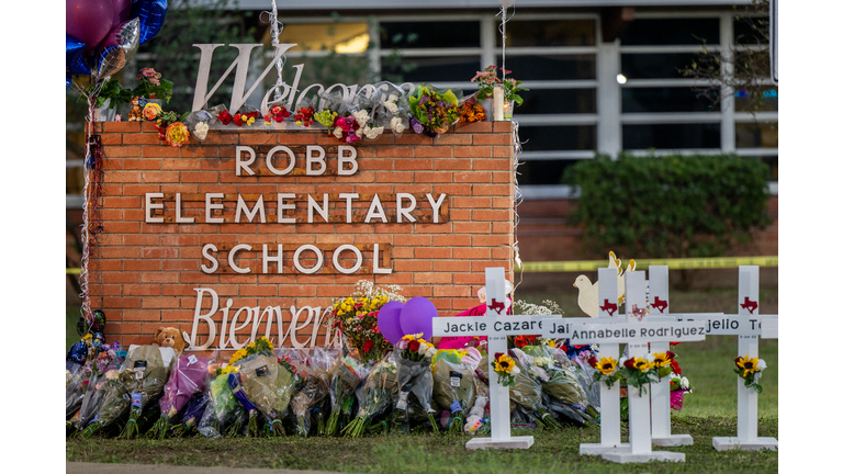 Scenes from outside Robb Elementary in Uvalde, Texas, following a mass shooting.