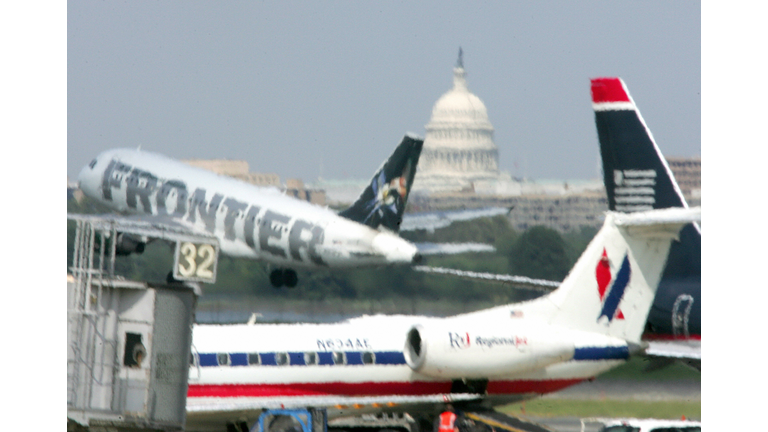 A Frontier Airlines jet takes off from R