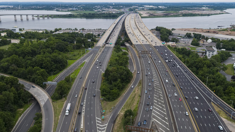 Aerial view on the huge complex road junction at the entrance to the Governor Alfred E. Driscoll Bridge over the Raritan River, New Jersey, connected Keasbey and Melrose towns.