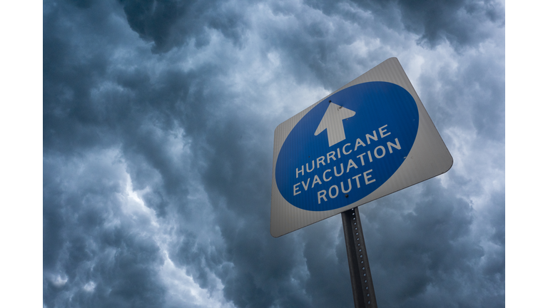 Hurricane Evacuation Sign Against a Stormy Sky