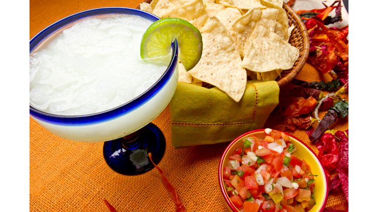 Margarita with lime and chips with salsa