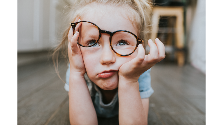 Bored Child in Glasses