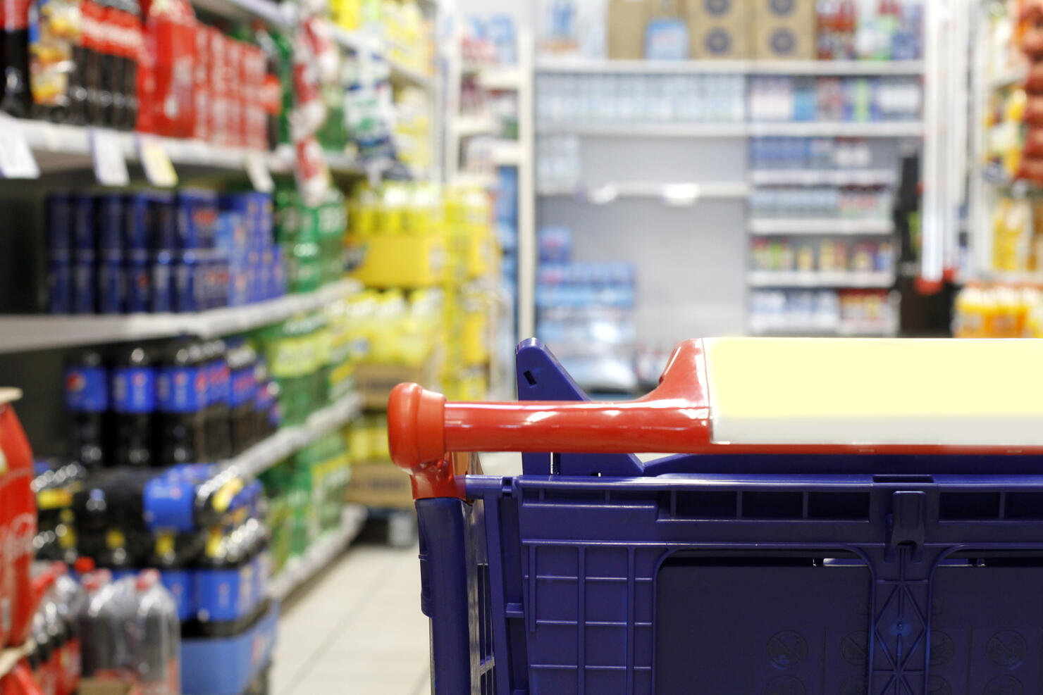 Empty shopping cart in the supermarket shopping mall