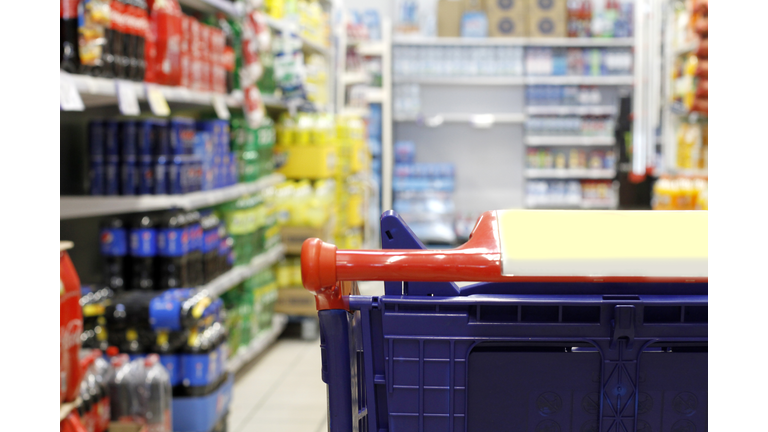 Empty shopping cart in the supermarket shopping mall
