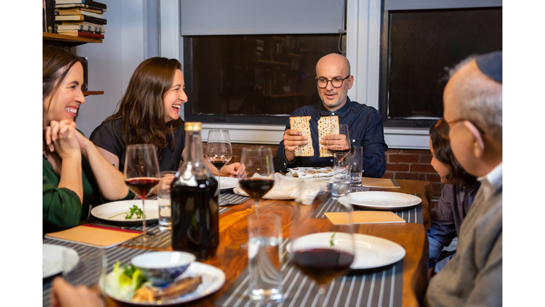 Breaking Matzo at Family Passover Seder