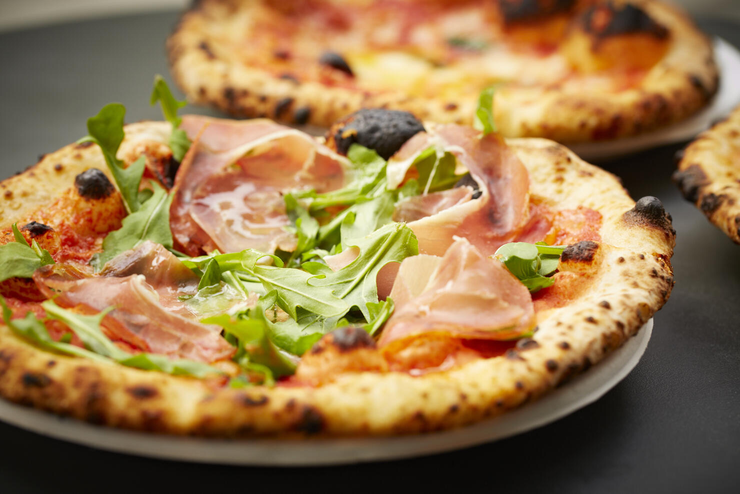 Neopolitan pizza with Proscuitto and arugula