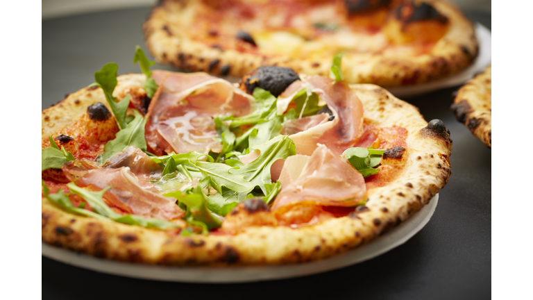 Neopolitan pizza with Proscuitto and arugula