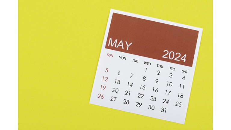 Desk Calendar 2024: May calendar is used to plan daily work and life on a yellow background.