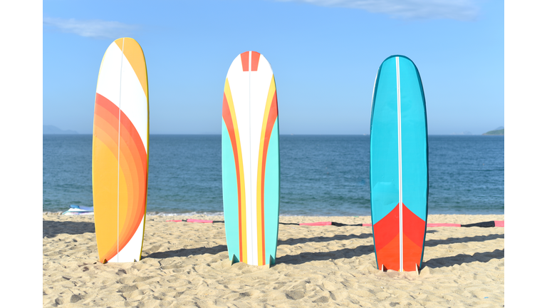 Surfboards on sandy beach in Vietnam
