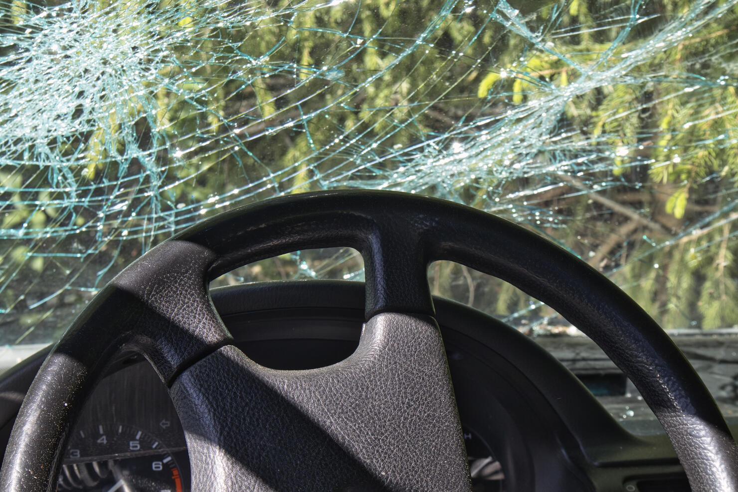 Abandoned car on the roadside forest after accident