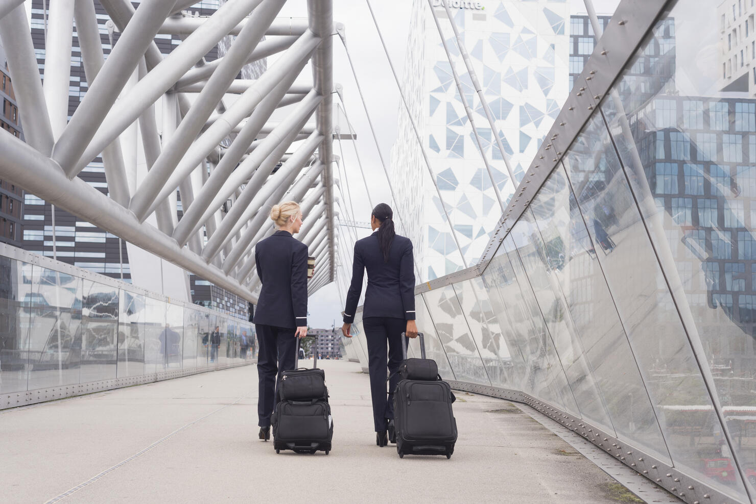Two female flight attendants at airport