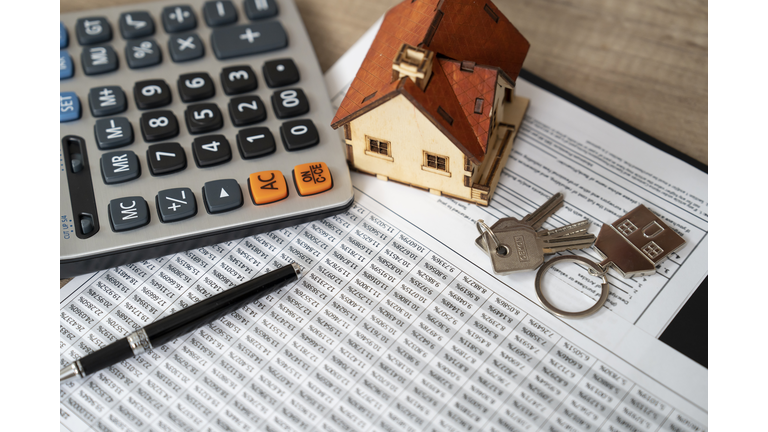 Money, pile coin with saving book and paper home,concept