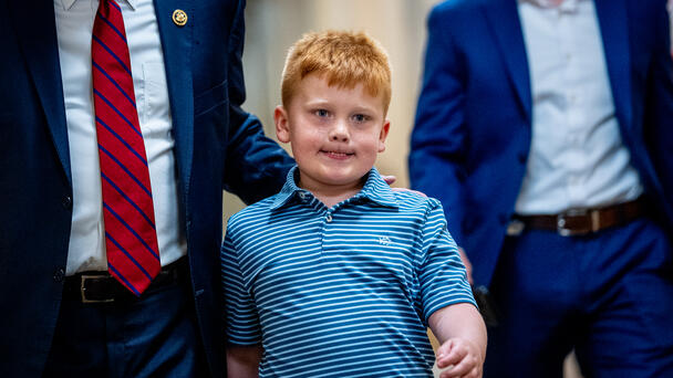 WATCH: Congressman's Son Makes Funny Faces Behind Dad During Floor Speech