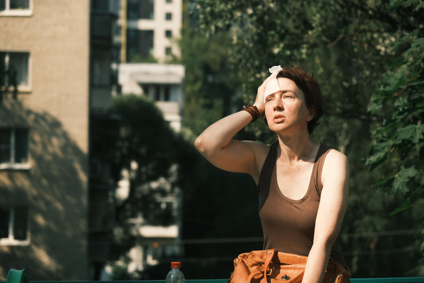 Woman suffering from heat wave