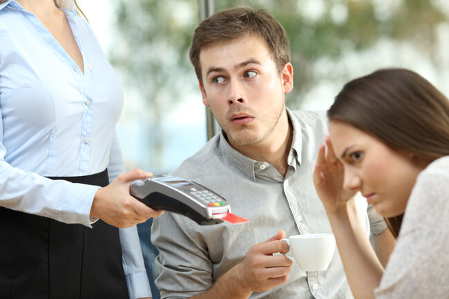 Boyfriend looking at waiter chest