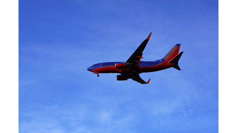 Jet 737 airplane low flying