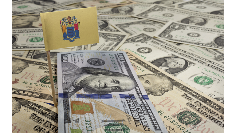 Flag of New Jersey sticking in various american banknotes.(serie