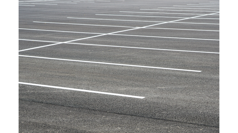 new asphalt area with white stripes for parking