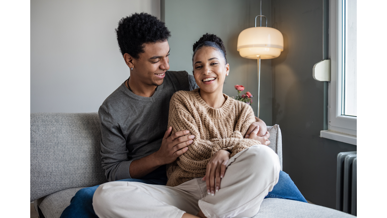 Couple relaxing at home on the weekend