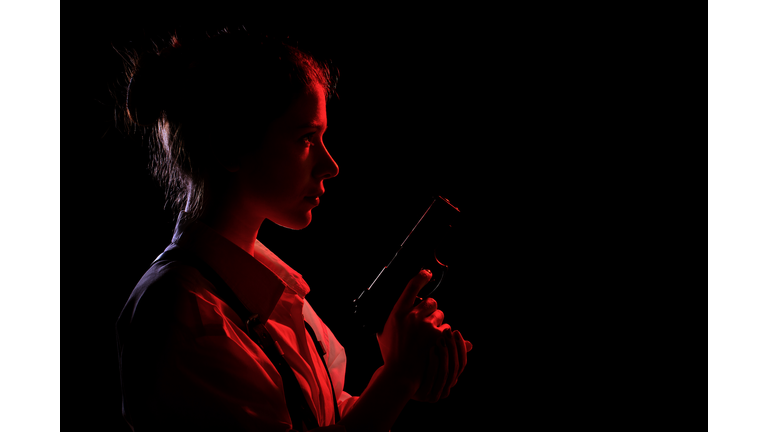 woman with gun