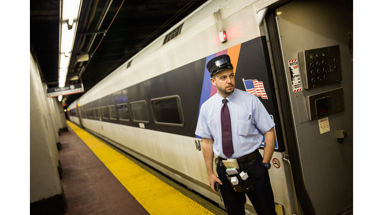 New Jersey Transit train and conductor